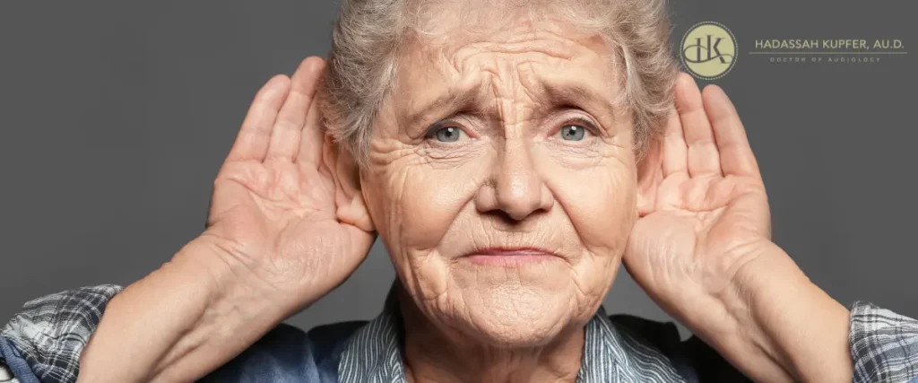 elderly lady has hearing loss